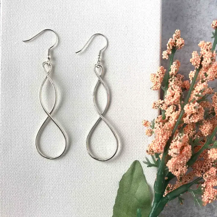 silver-double-helix-handcrafted-artisan-earrings-kantha-jewelry-museum-outlets.webp