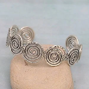 hammered-silver-spirals-cuff-bracelet-unique-affordable-jewelry-musuem-outlets.jpeg