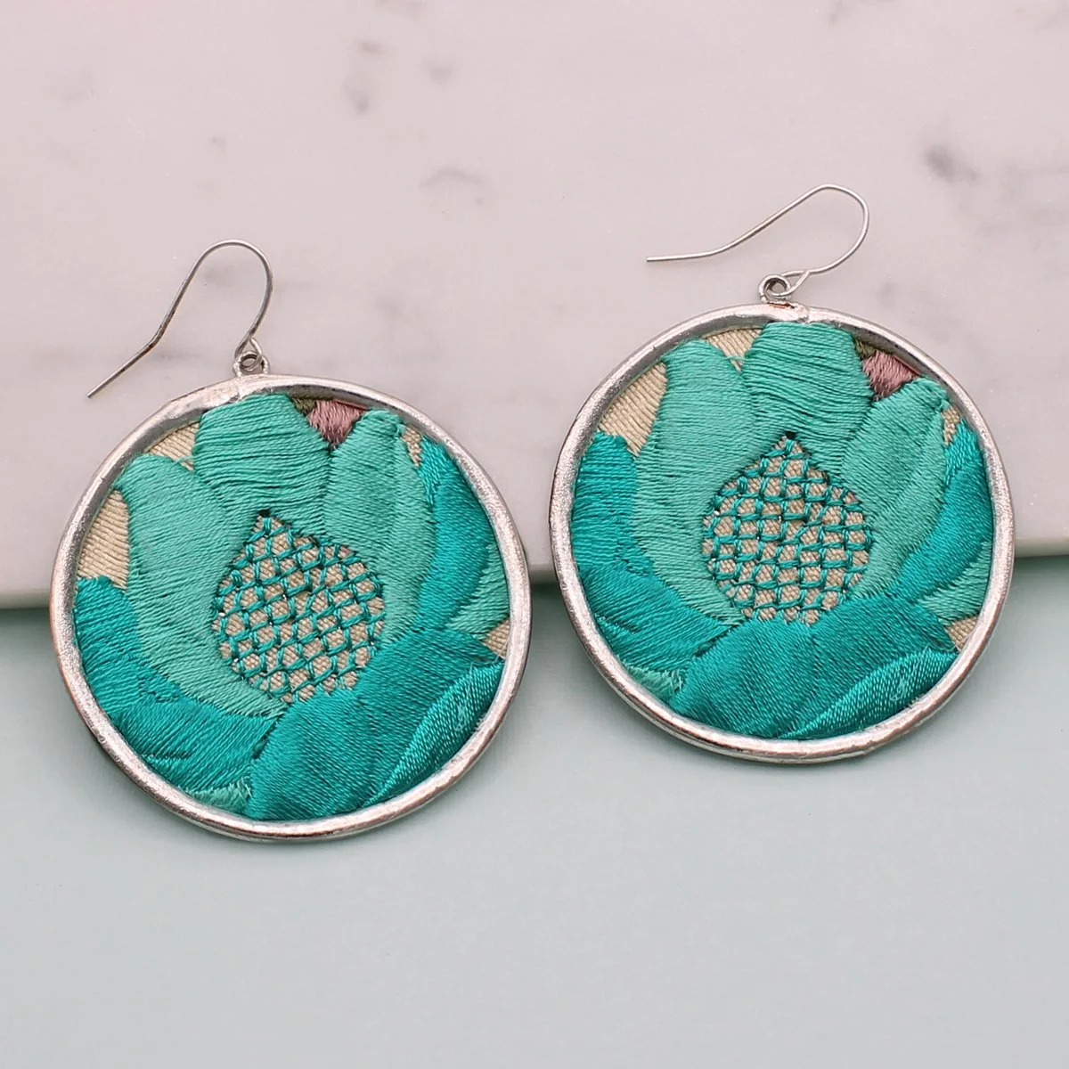 teal-round-silver-vintage-earrings-embroidered-unique-affordable-jewelry-museum-outlets.jpeg