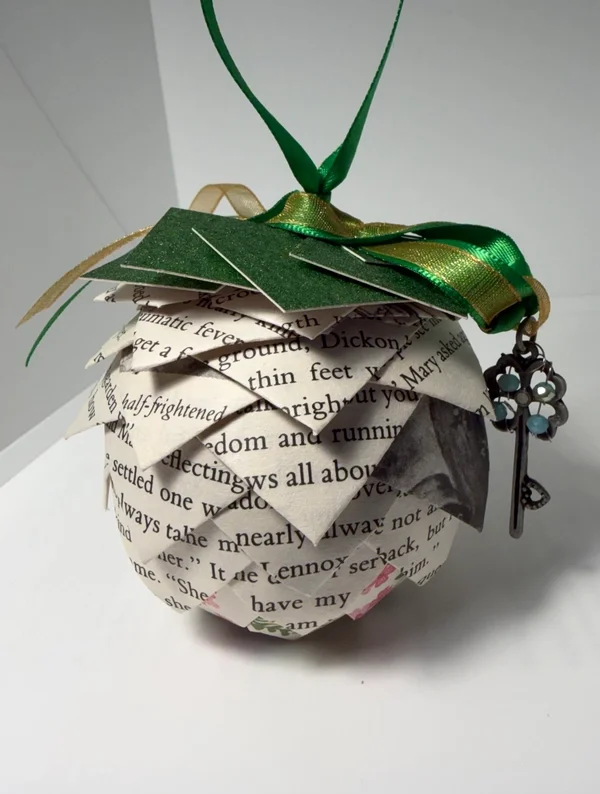 secret-garden-recycled-book-pages-ornaments-museum-outlets.webp