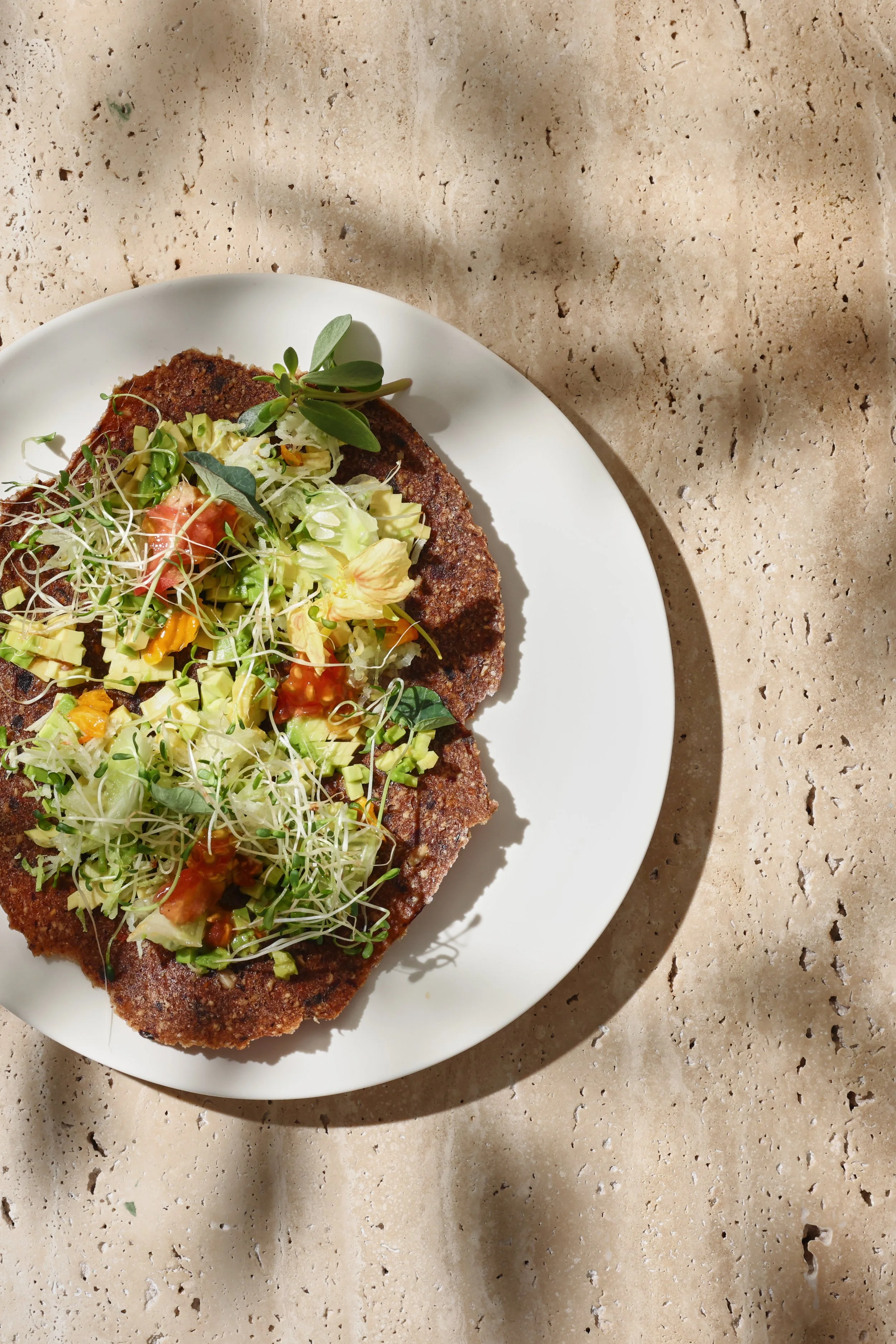 AVOCADO TOAST. SEEDED FLATBREAD. CUCUMBER. CHILI. SPROUTS.jpg