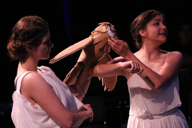 Meredith Sullivan and Krista Marie Ivan in the University of Pittsburgh production of Aglaonike's Tiger . Mask by Michael McDevitt . Photo by Amanda Olmstead.