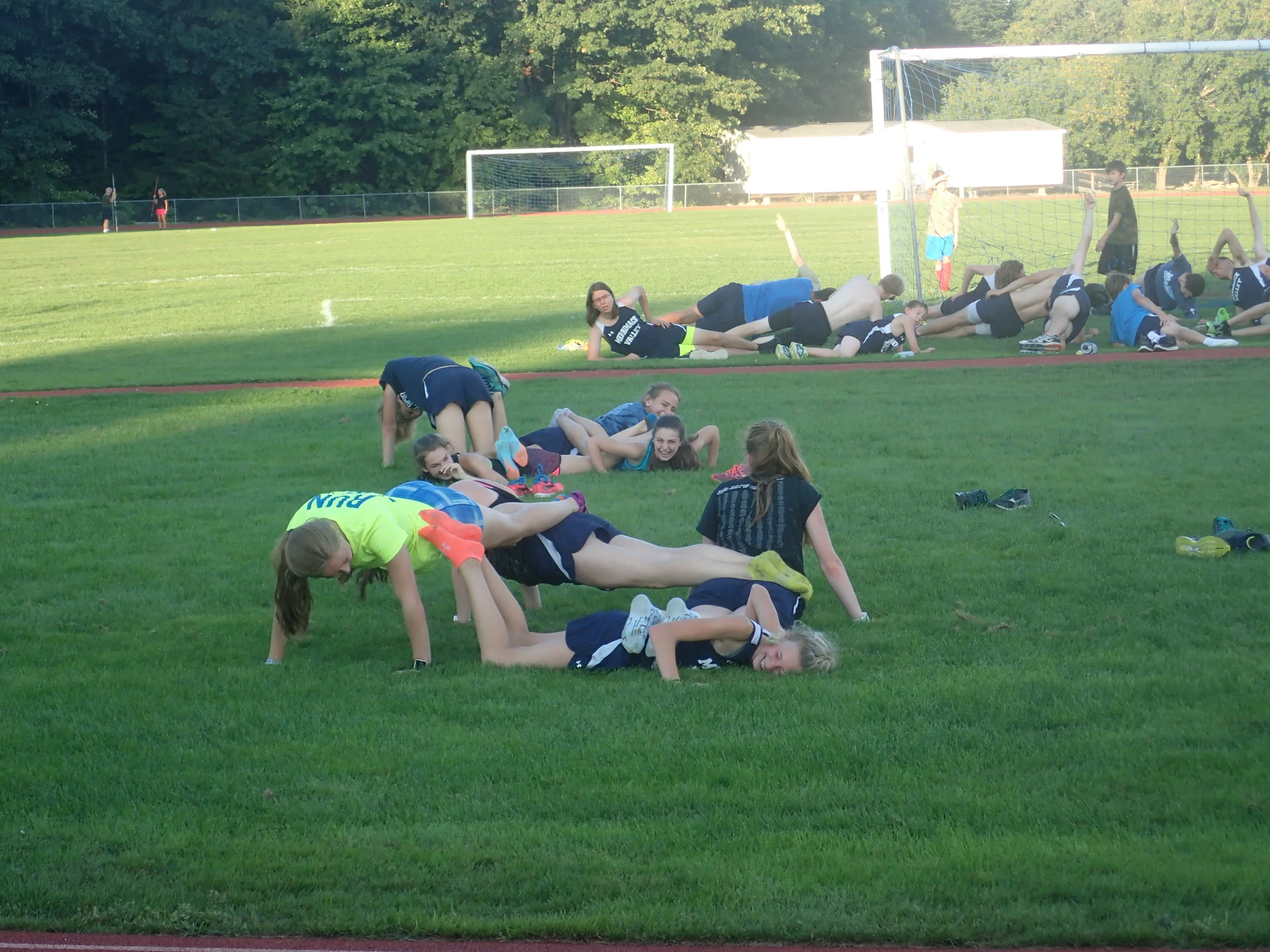 Sorry Girls, I'm Still Not Believing the Four-Person Push-up Happened. PS - Nice Plank, Mitchell!