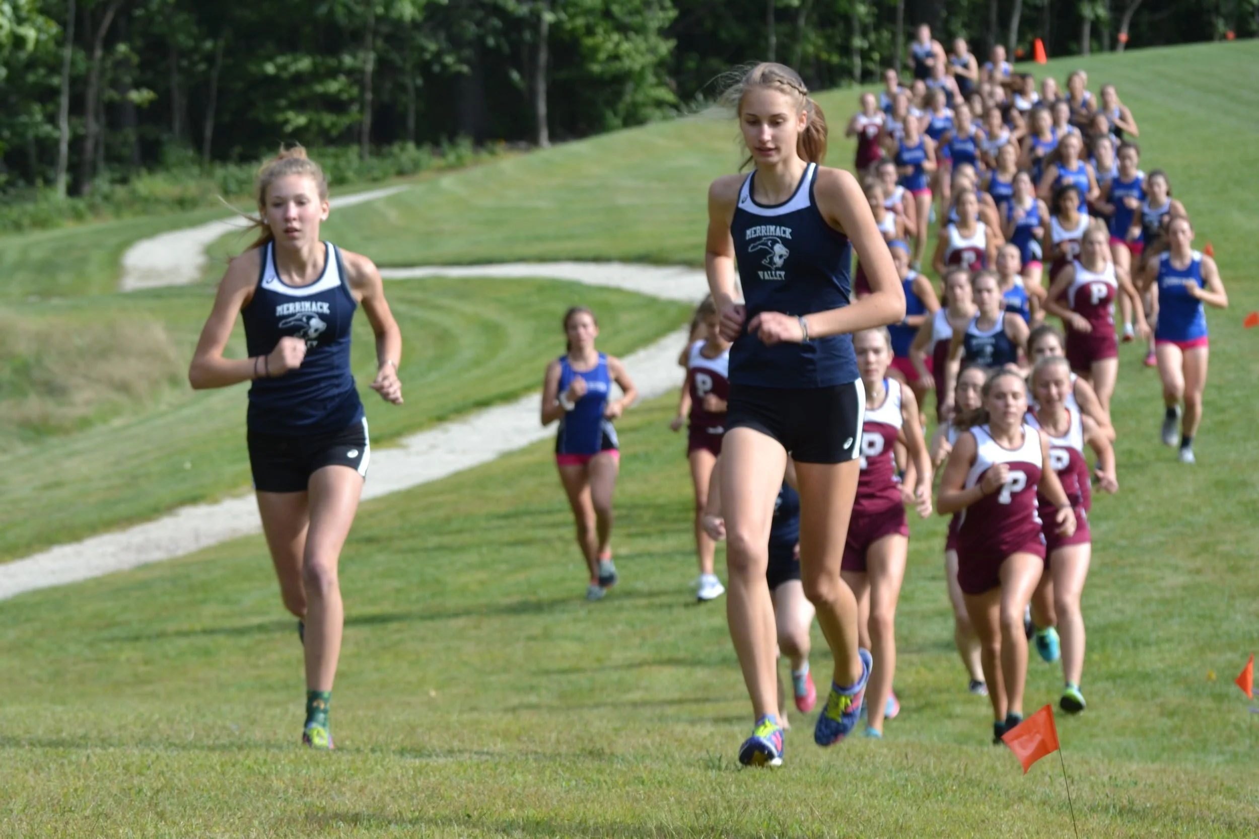 Noelle and Emma charge the first hill