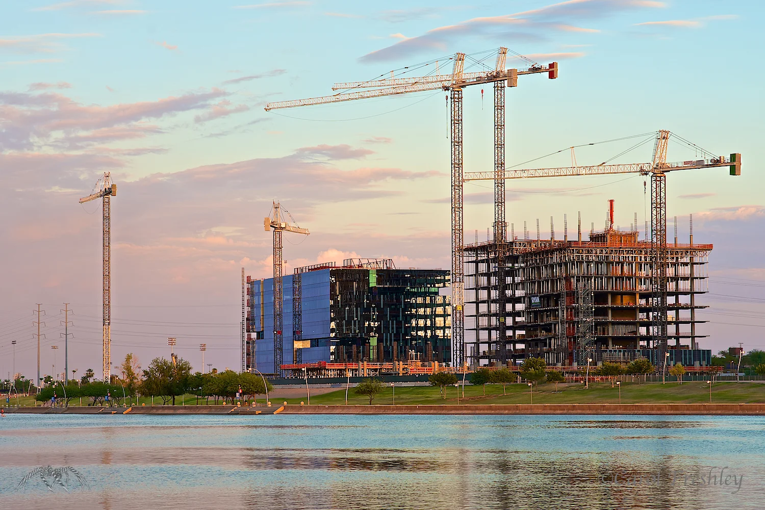 ISO 100, 70mm, f/8, 1/8 at 7:07 PM. My expectation is that the moon will rise between the most left crane and the middle building under construction. Aside from being quite bright with the sun still not having set, I am thinking the clouds to the East just might be a problem! Check weather app. Yep, clouds are going to be a problem. Dang it!