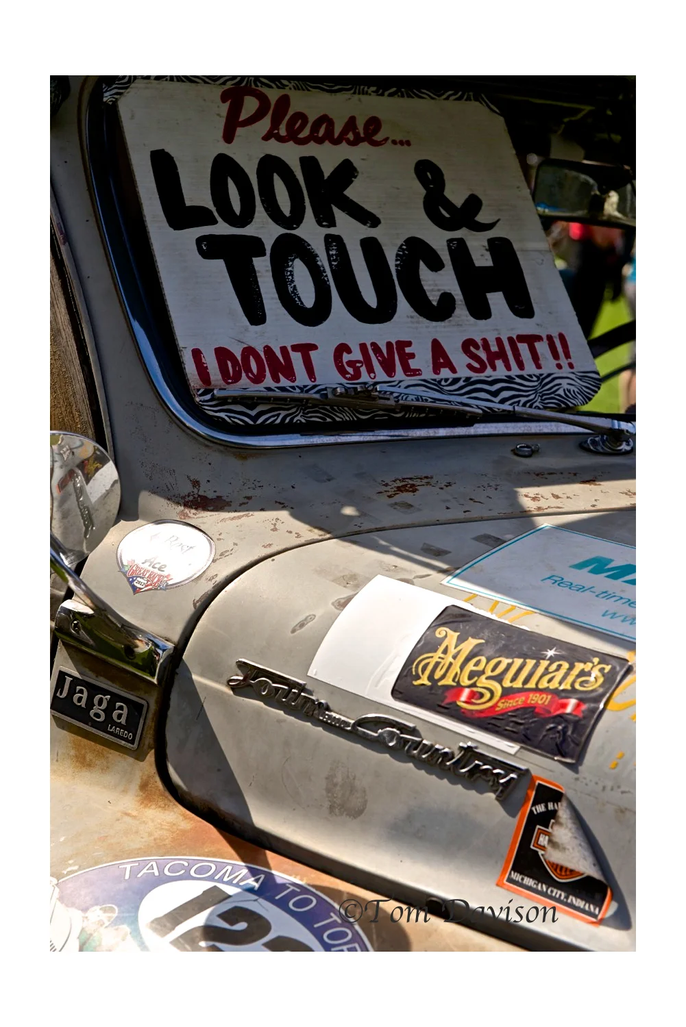 A rather direct response to the signs posted 'around' the elegant cars at the 'other' event.