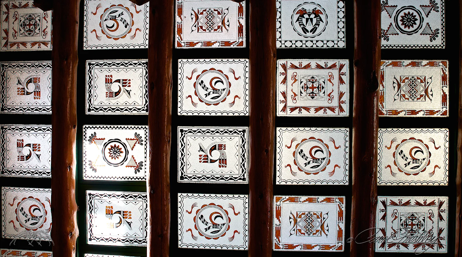 The woman at the desk said, "The best way to shoot that skylight is to go down 5 steps, position your camera on the fourth step, contort yourself beyond recognition, pray you don't dump your camera in the process. Shoot quickly!" She was right. These are patters of famous Navajo rug patterns. No, I still have not managed to straighten my body back to normal shape so no laughter the next time you see me.