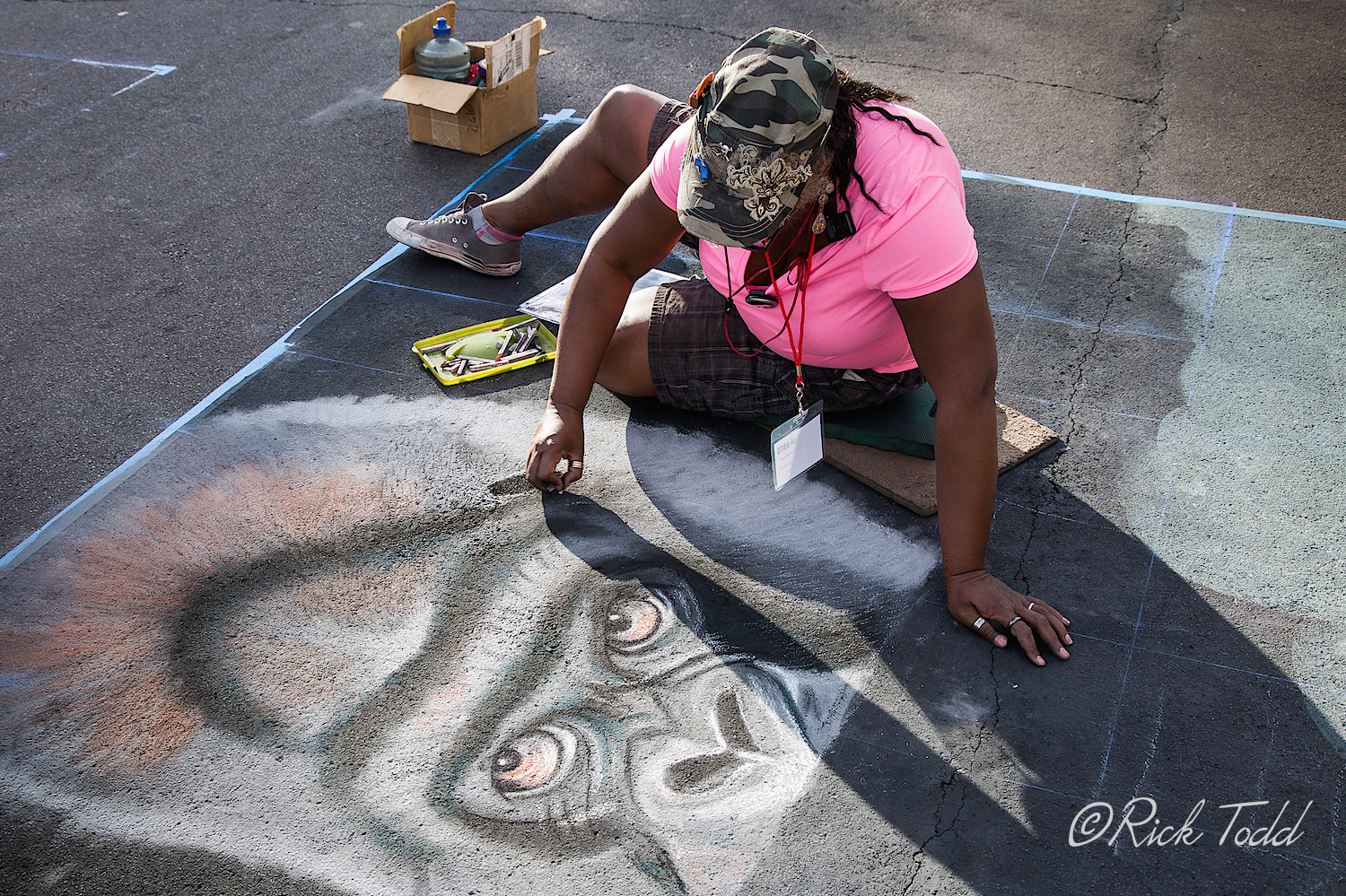 When finished, this chalk art gorilla will be shown reading a book entitled, "The Origin of Man".