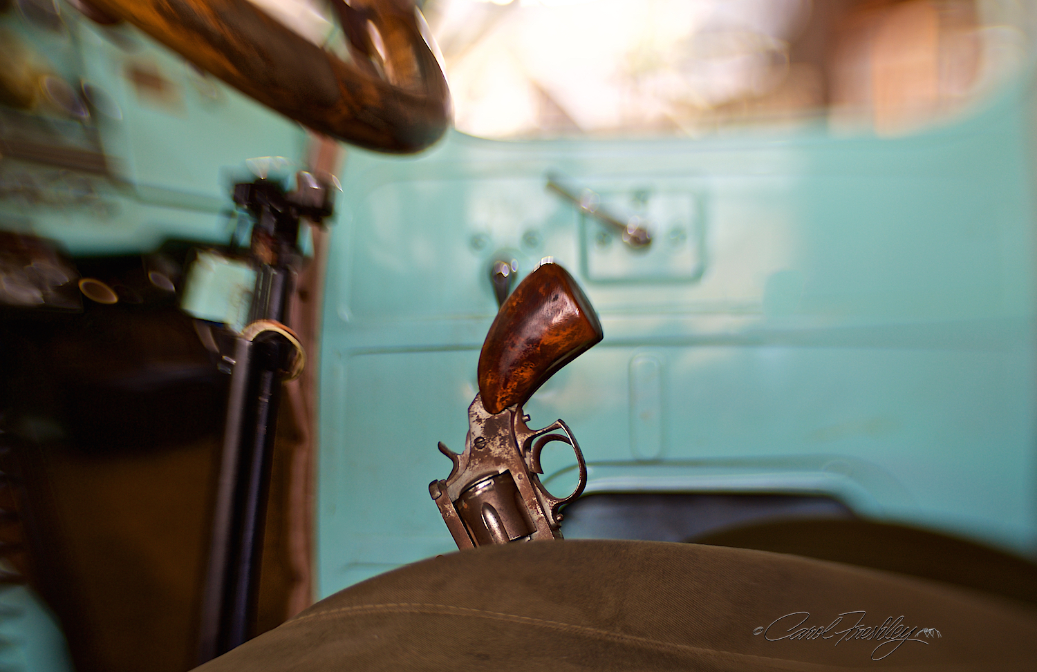 Pistol for the brake, double barrel for the stick shift and a gorgeous custom interior and wood steering wheel!