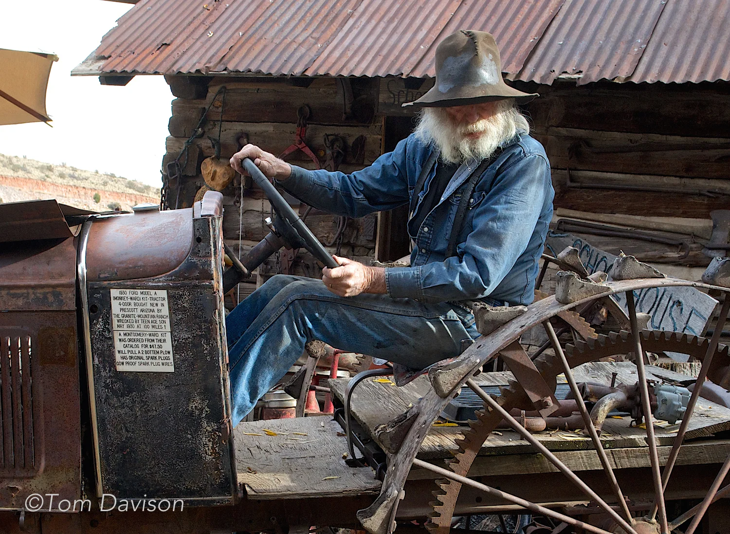 That sign on the tractor is enlarged below. In addition to taking photos, you get some useful information on 'old stuff'.