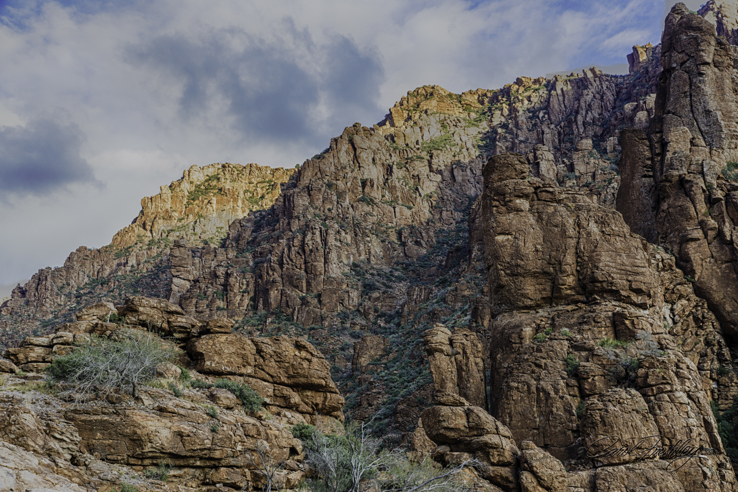 These are the majestic rocks that are on both sides of the canyon as you approach the tunnel just before going into Superior. 