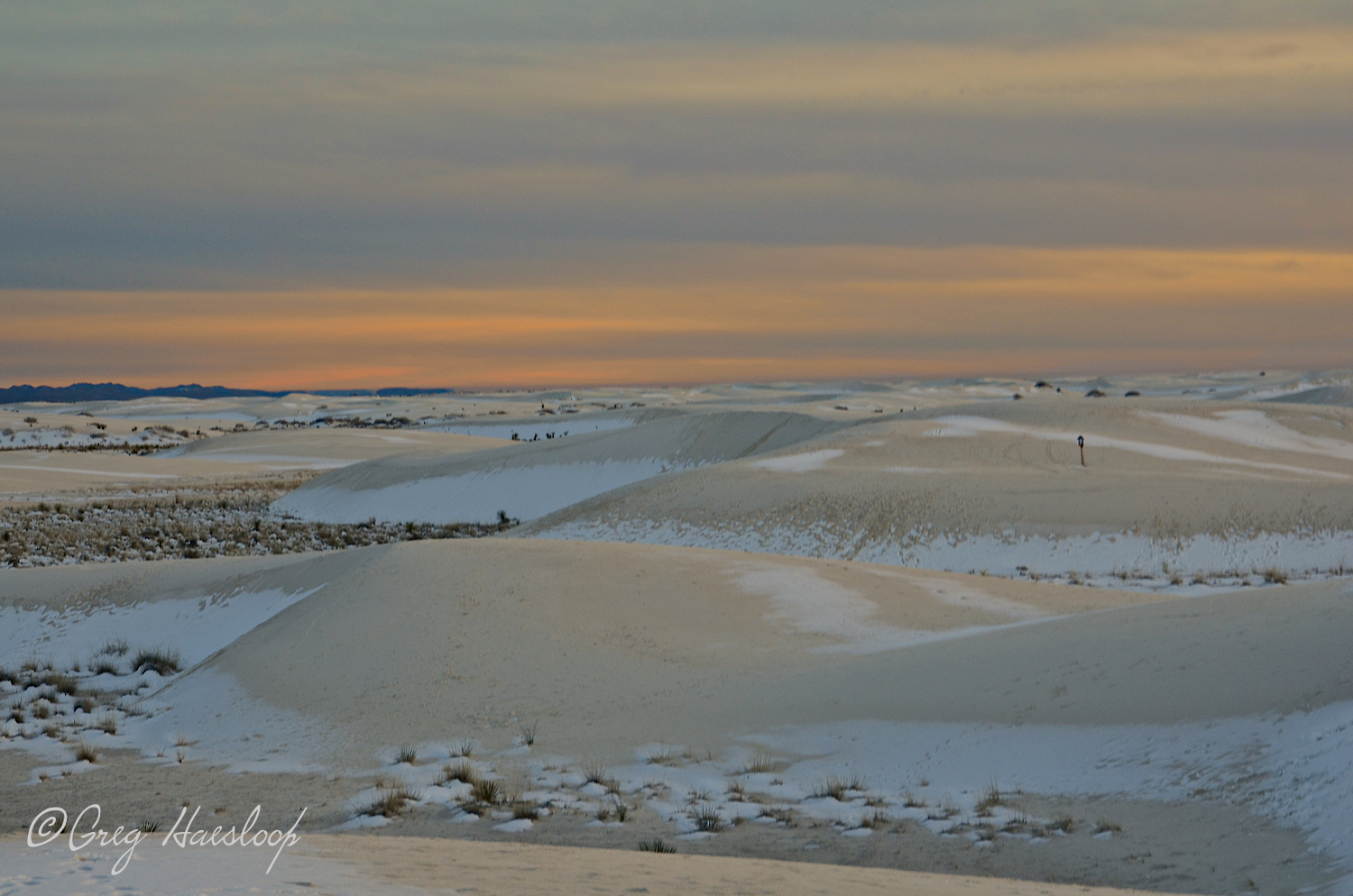 Whether there is snow or just sand, the sun eventually sets, daily, actually. This is looking south as the Ranger drives by and breaks the intensely meditative mood set by this sort of scene. "The monument is now closing. Please head to the exit." 