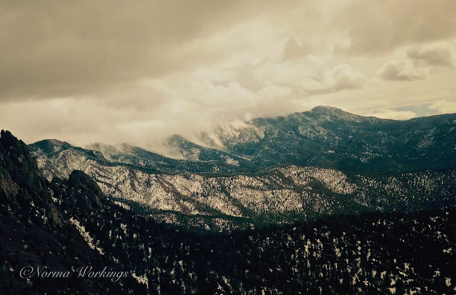 We both loved how the clouds were drifting down the canyons of the mountain.