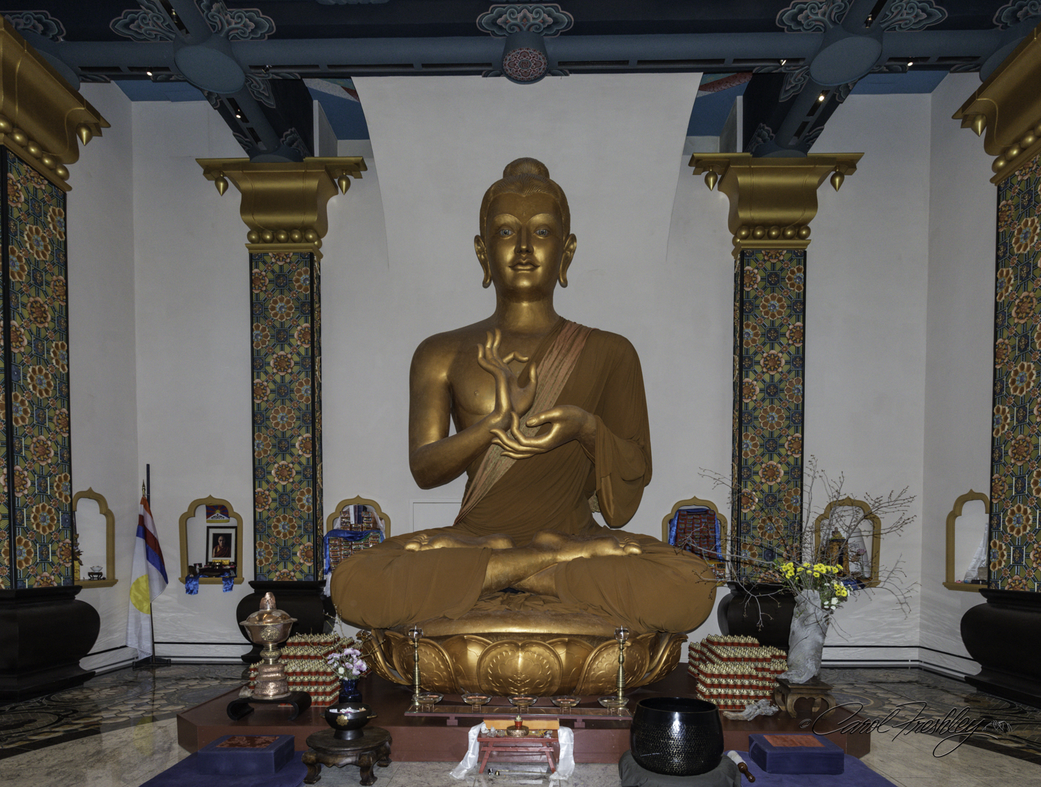 We waited quite a while for the room to be empty so we could walk closer to the front and around the sides without distracting or disturbing any person who had come to meditate. Notice the small alcoves around the room. Each one had different items, as shown below.