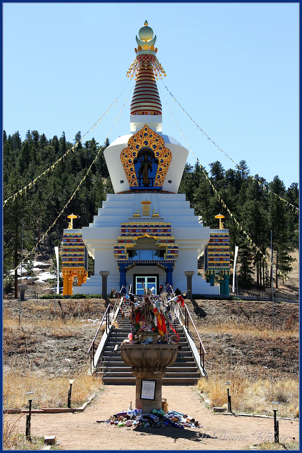A most interesting pause before climbing the steps. People leave all sorts of offerings.
