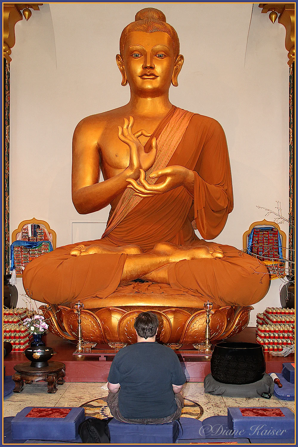 Once inside the Stupa we notice a young woman meditating. We were quiet while appreciating the sense of scale she provided.