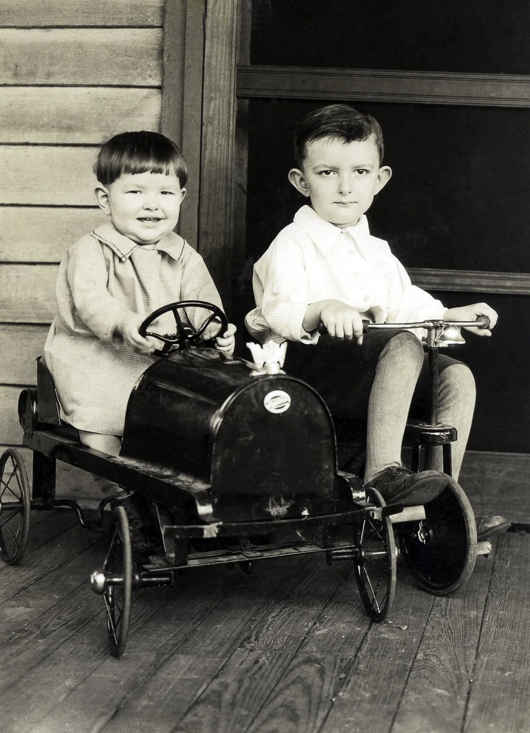 Here we see what was to become a lifelong discussion about 'the Griffith ears'. Mom is with her older brother, Nelson. He had a successful career in the Navy. Mom would jest that it was a good thing that the wind never caught him at an awkward angle because he might have become airborne! 