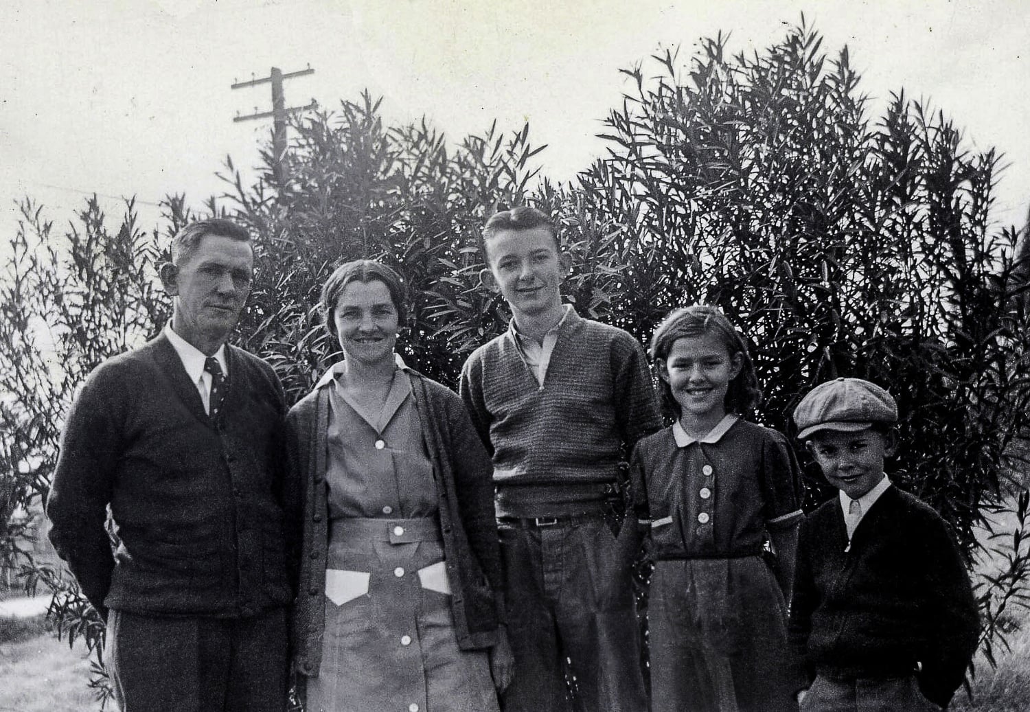 The only photo we have of her with her parents and both brothers. Her dad was a bricklayer and had difficulty finding work in Phoenix. He returned to Charleston leaving my grandmother to raise the three kids on her own. This meant that our mom took on a huge responsibility for taking care of the house, cooking and watching over her younger brother. She later recalled with pride how she managed the food budget her mother gave her. She was 12.