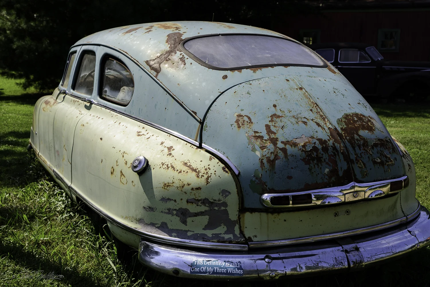The car was interesting. The bumper sticker made it photo-worthy!