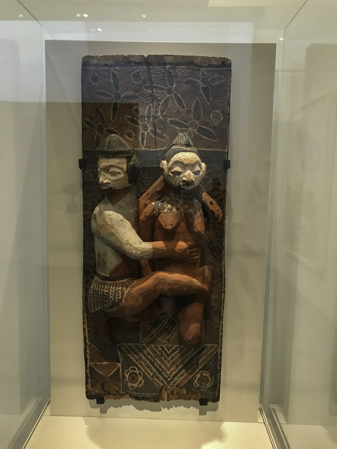 Panel, wood with pigment, Nkanu culture. This was another example in the exhibit which sought to show how other cultures influenced Picasso. "This panel shows a couple whose arms are entwined, yet they look in opposite directions. Displayed in a restricted area, the young people who saw it learned about proper sexual behavior. Although Picasso also depicted couples embracing, his works, in contrast, often have vivid and erotic intensity."