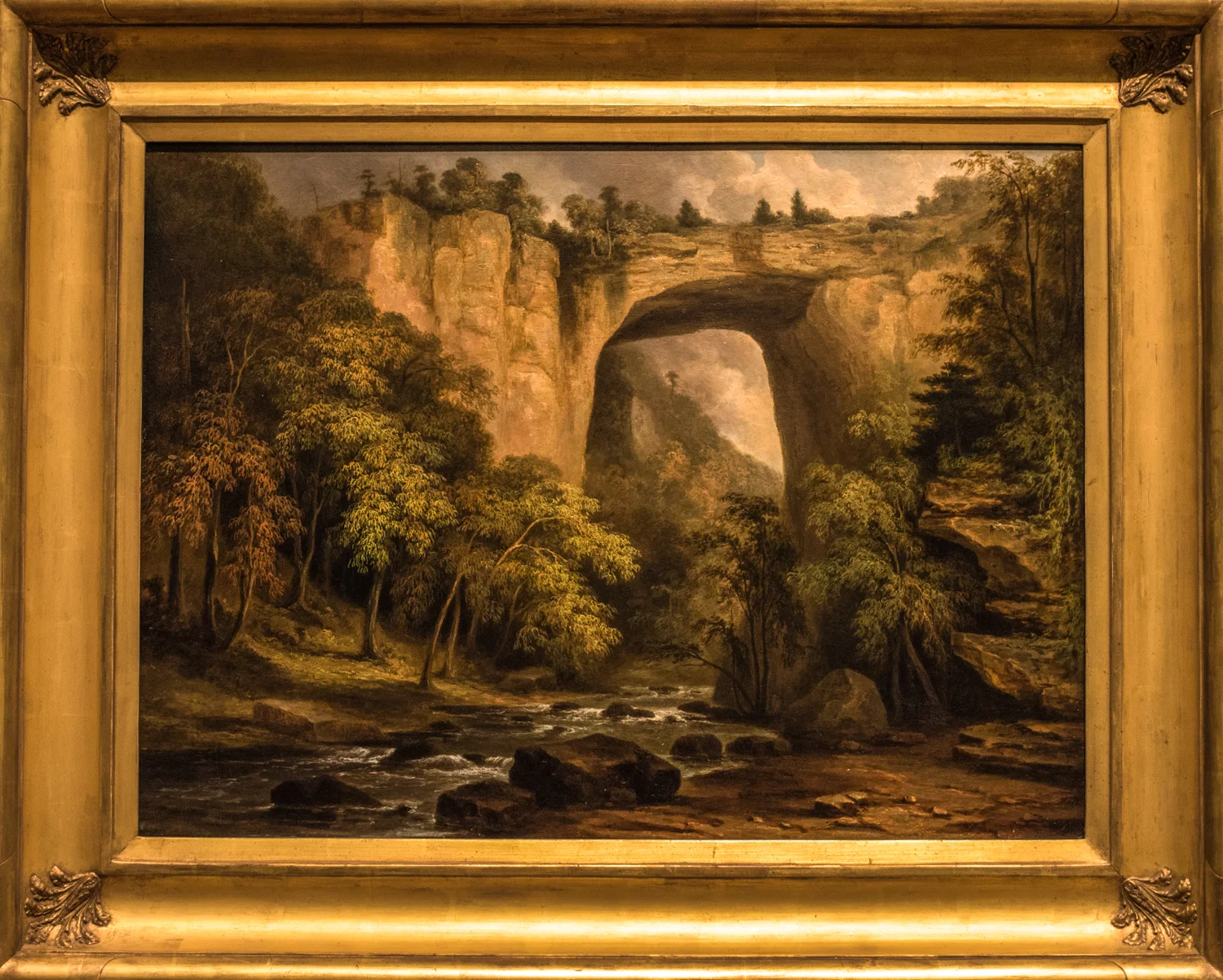 Natural Bridge, Virginia 1835 by Jacob C. Ward (1809-1891) Oil on panel. "Jacob Ward painted the Natural Bridge in Virginia so that viewers gaze at the geological marvel from below. This low vantage point emphasizes the 200-foot height of the bridge. Listed among the natural wonders of the world, the Natural Bridge was first owned by Thomas Jefferson, who received it from King George III in 1774. During the early 19th century, many artists rendered the Natural Bridge because the site ranked with Niagara Falls as one of the new nation's most inspiring landmarks and tourist attractions. Such natural monuments were thought to distinguish America from Europe."