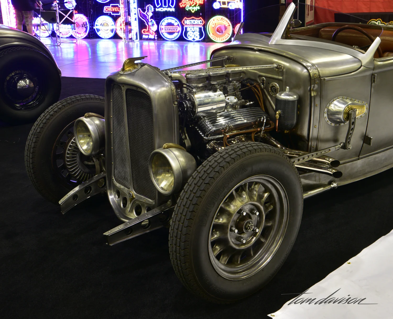 This is a partially complete roadster on display in one of the builder's booths. It has many hand made parts.