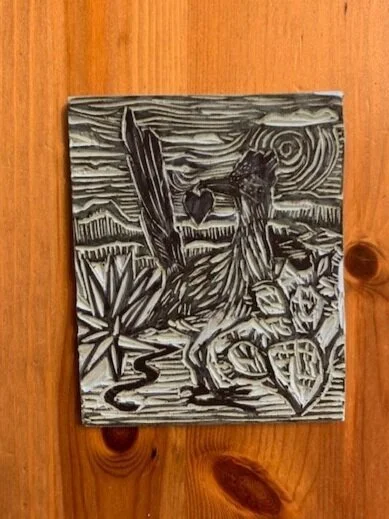 3. Here is the final stamp, carved with the black indicating the areas that will be printed. As you can see, the Sharpie ink remains.