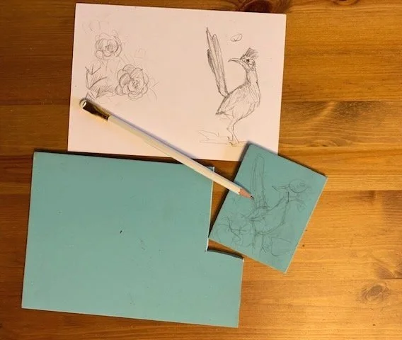 1a. This process always begins with a conceptual drawing. Zach and I discussed options from cranes and cacti to roadrunners. We settled on a roadrunner. 1b. Once I finalized the idea, I transferred the drawing to lino (or “linoleum”) and cut out the…