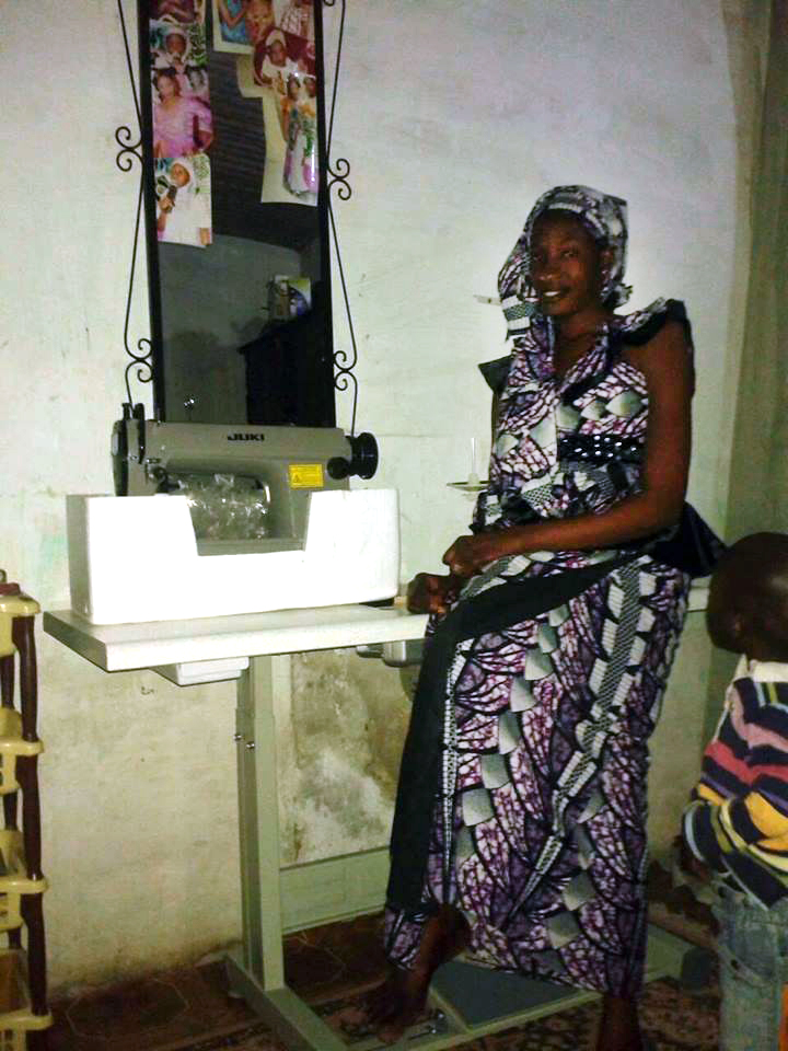 Karim with her new sewing machine.