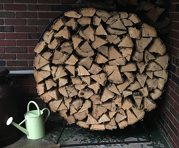 We love cozy fires! This is the wood pile in our backyard.