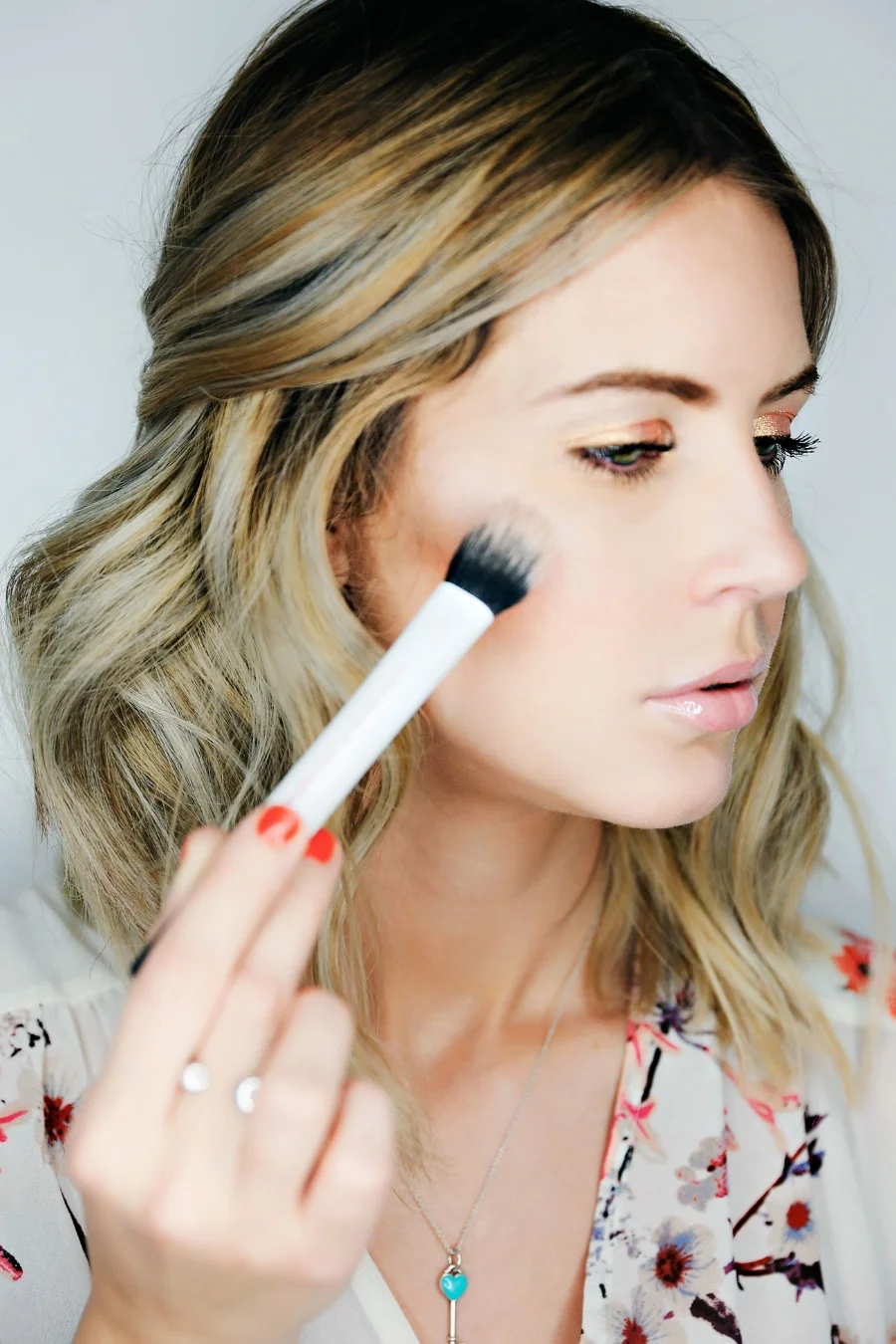 My absolute favorite, holy grail shimmer highlight is Mac Mineralize Skin Finish in the color Soft and Gentle . Peeps, highlighters don't get much better than this one. Take a Real Techniques Duo Fiber Contour Brush and with a light hand, apply that bad boy highlight to the very tops of your cheek bones. Your skin will have never looked so amazing!