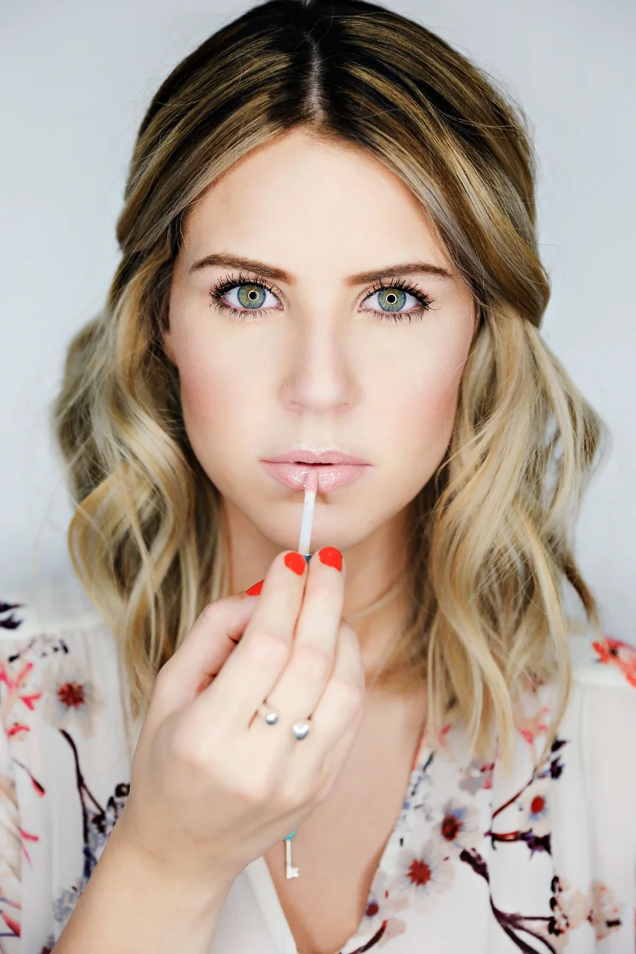 My favorite lip product is Buxom Lipgloss in the color Sandy . Its a little bit of a pretty penny but oh man, is it worth it! It tingles your lips a little so it gives them a nice little plump!