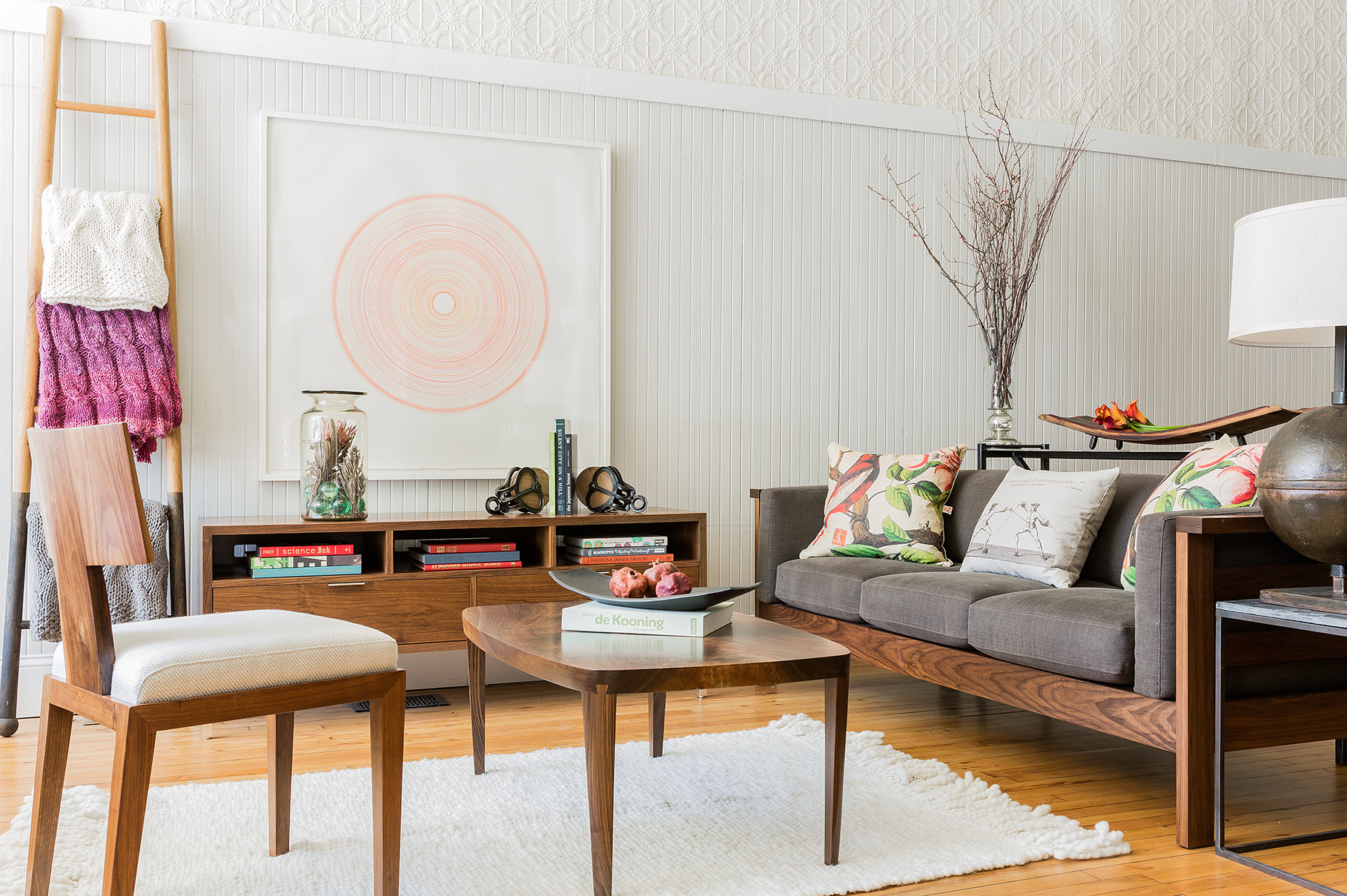  Panel Sofa 84"w, Media console shown in walnut, slab coffee table in walnut.&nbsp; Art by Nathaniel Price. &nbsp; 