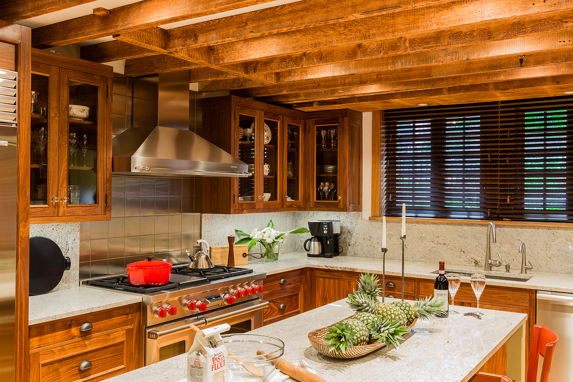   Beacon Hill walnut kitchen with original beams, stainless steel tiles and Kashmir granite.  