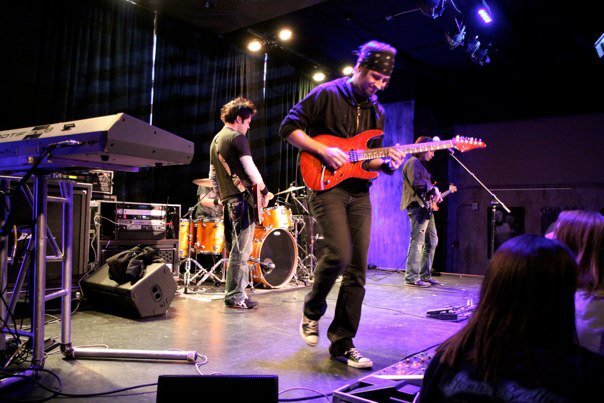 Andy Wood performing with Down From Up in 2010