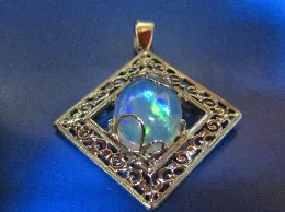 Opal and white gold filigree