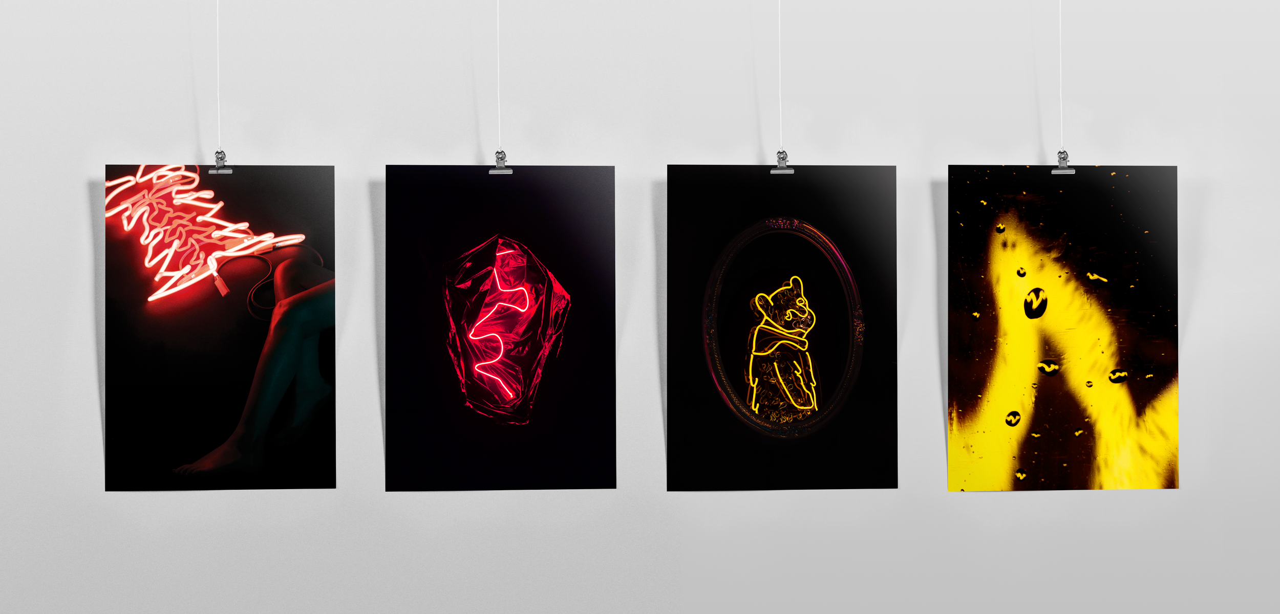 The four prints of each neon piece available for purchase at the show and online. Shop here.