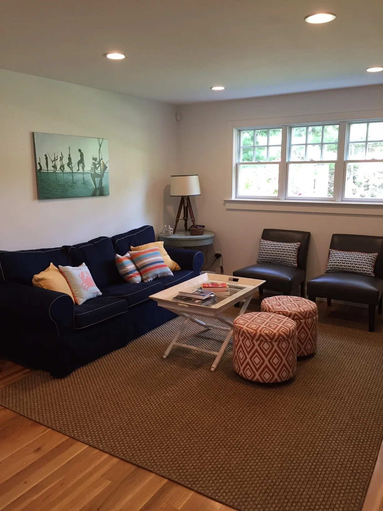 One last shot of the living room. I loved the piping on the sofa and the variety of colorful French pillows they used.