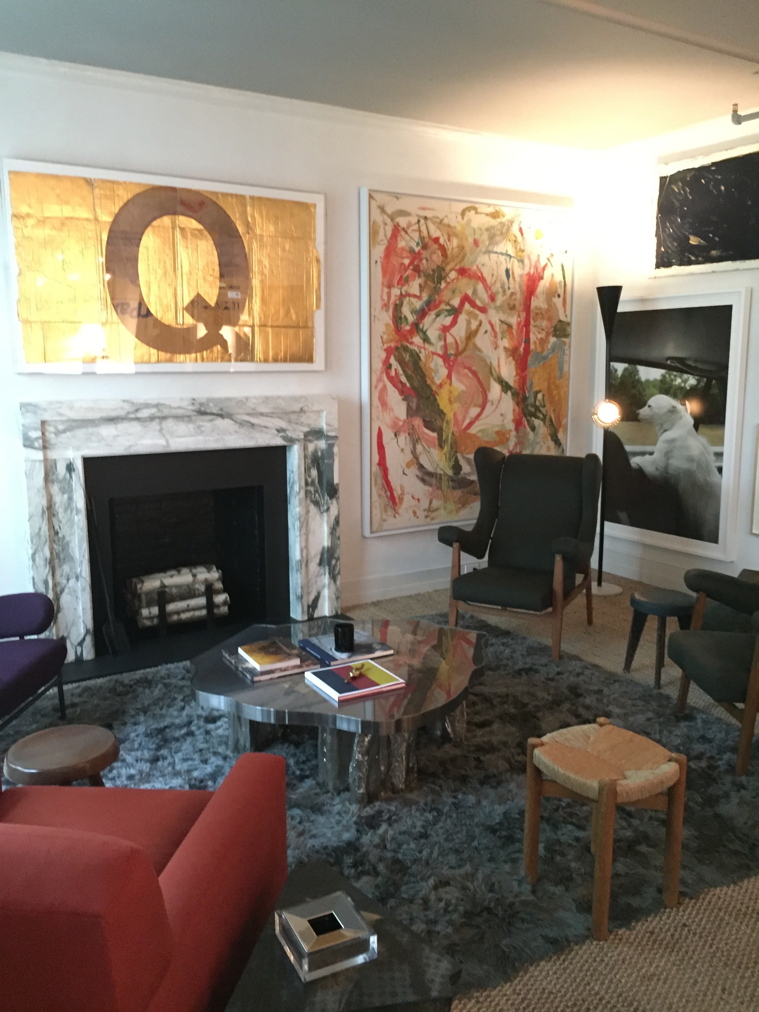 One view of the room - so much artwork in mixed mediums.