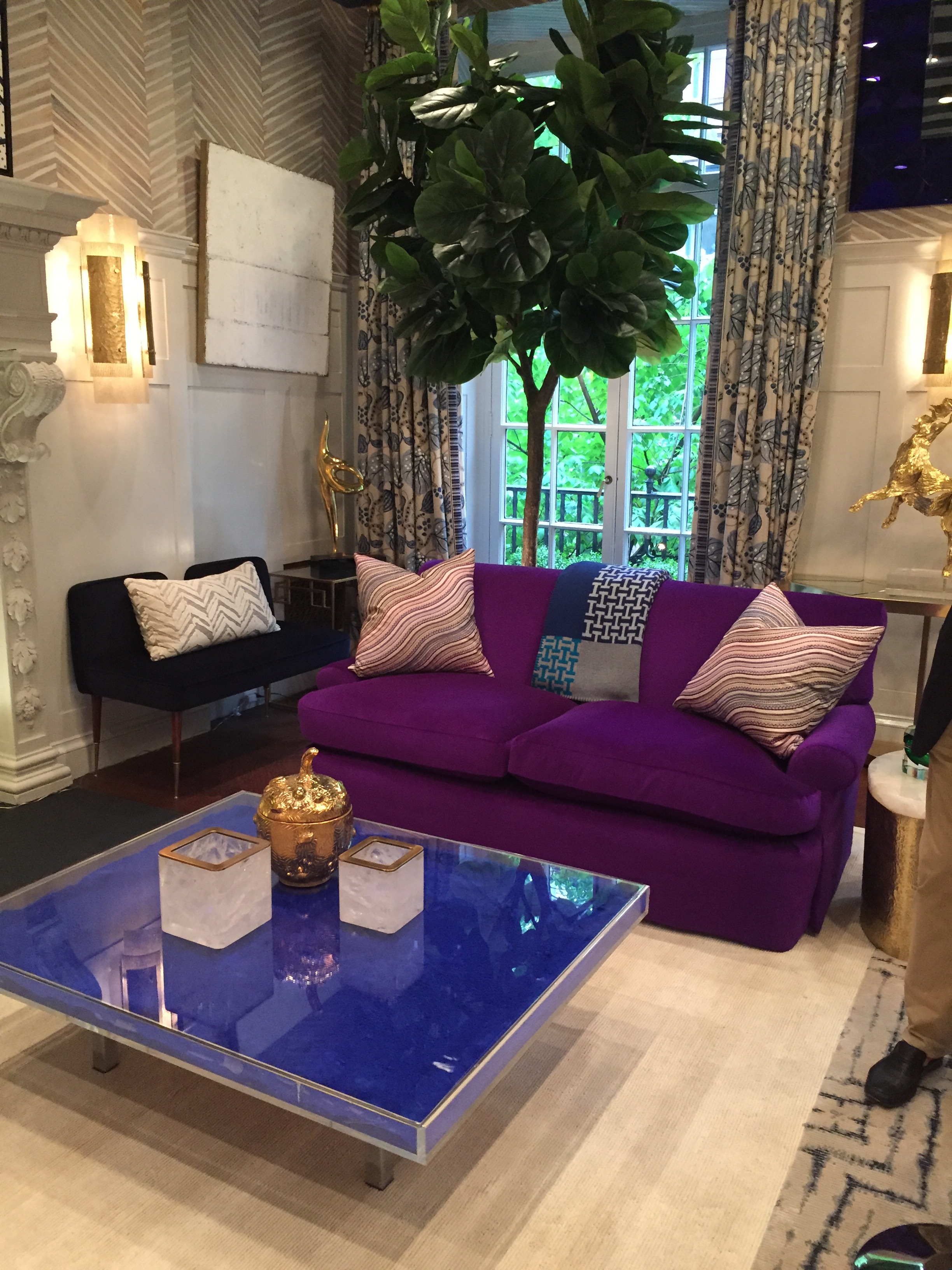 I neglected to snap a pic of the artwork in this room by Kirsten Kelli (which had a lot of cool pop art) because I was mesmerized by this purple, velvet sofa. Such a great color! This was probably my second favorite room behind Robert Stilin's. Super bold and interesting.