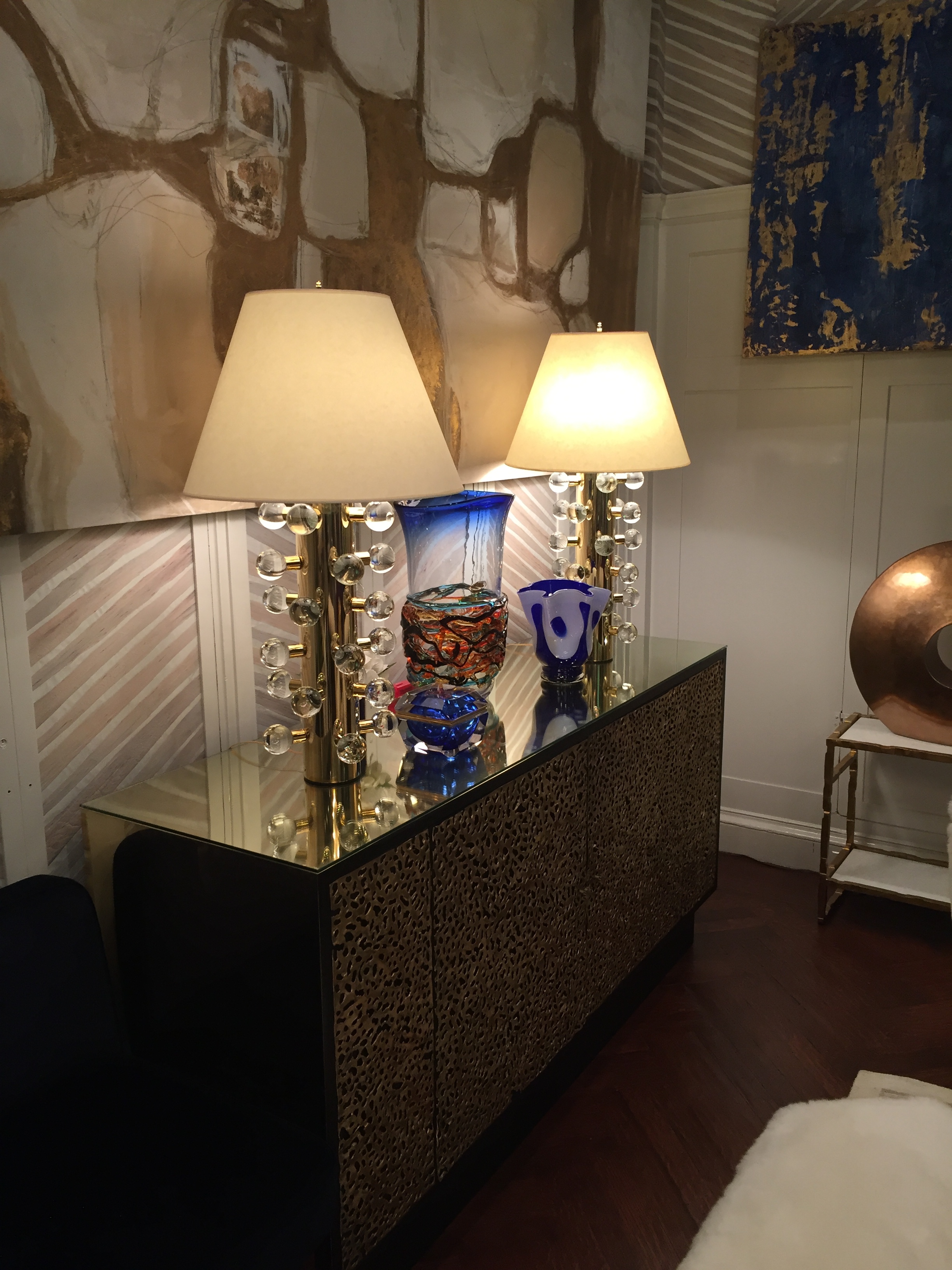 I thought these brass and lucite lamps in the same room were very funky too.