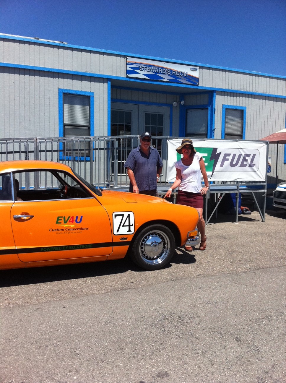Corwin Nichols and Lori Hodges checking out a converted Volkswagen Karmann 