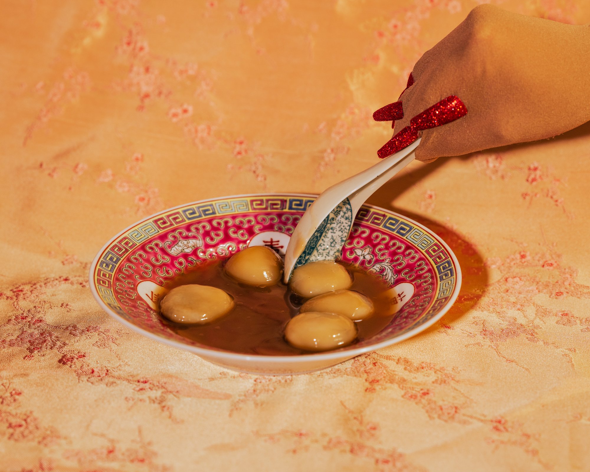  Still from  Eating Tang Yuan (at the Comb Ceremony) , GIF, 2022 