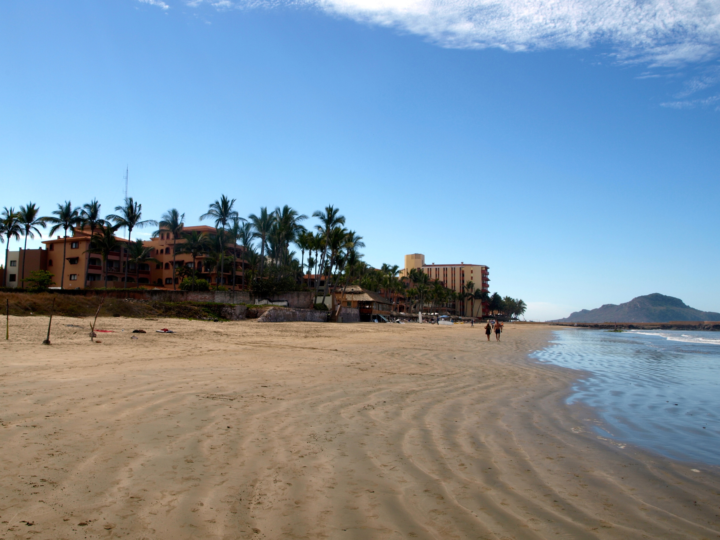   Rooms are more traditional Mexican in style and slightly dated compared to the elegance of Emerald Bay. But each has a balcony with an ocean view overlooking the lovely pool area and two charming restaurants. The beds are equally comfortable and th