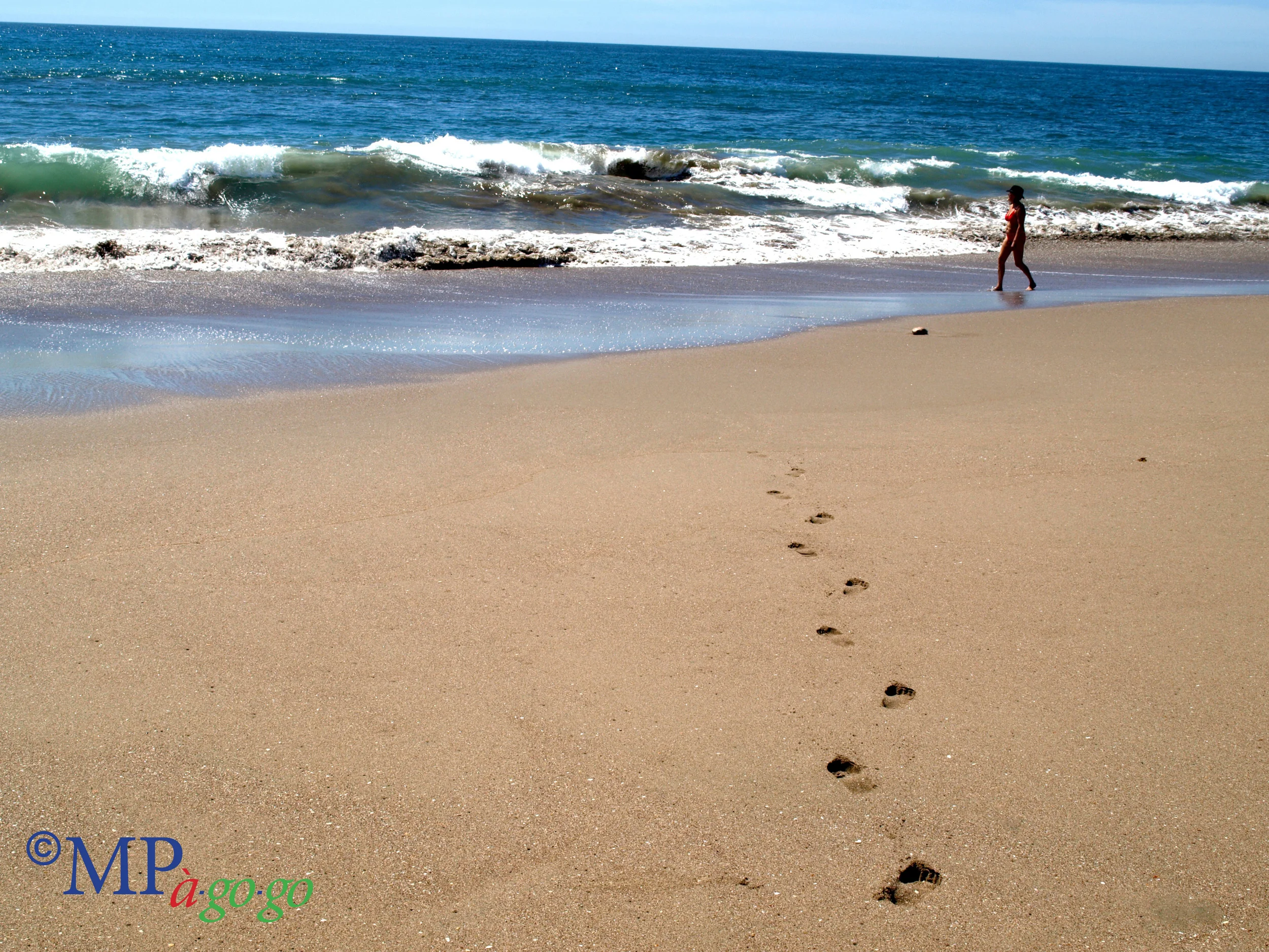   LOVE :      A walk on the beach—Camino a la playa   Whether you want a relaxing stroll or a vigorous walk, grab your sunscreen and visor and a bottle of water and head down the beach for a sun-filled day of surf and sand. 