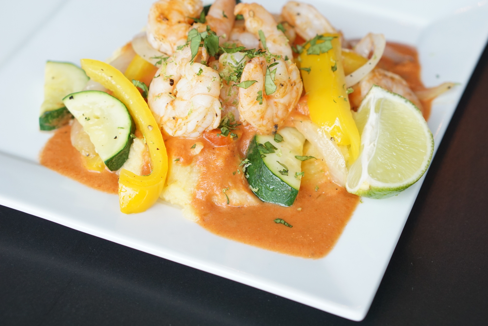 Finished dish. Mashed rutabaga with the tomato coconut sauce covered with the veggies and shrimp. It was outstanding. 