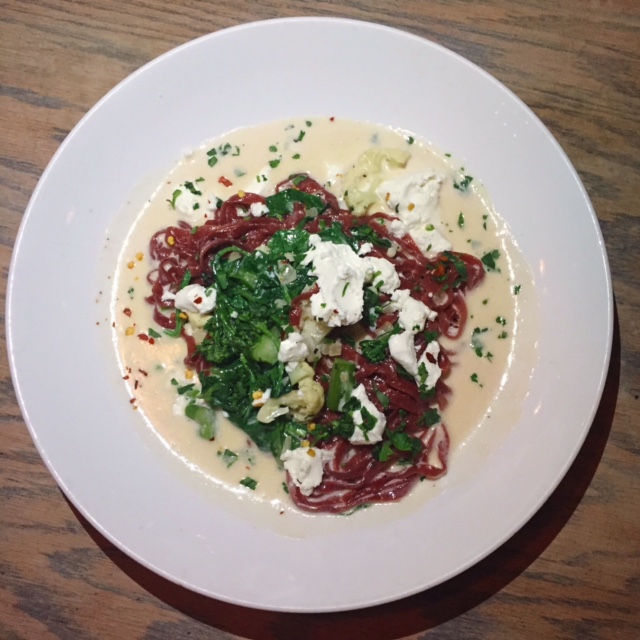 Roasted Beet linguine with broccolini, cauliflower, spinach, goat cheese, in a garlic cream sauce. OUTSTANDING