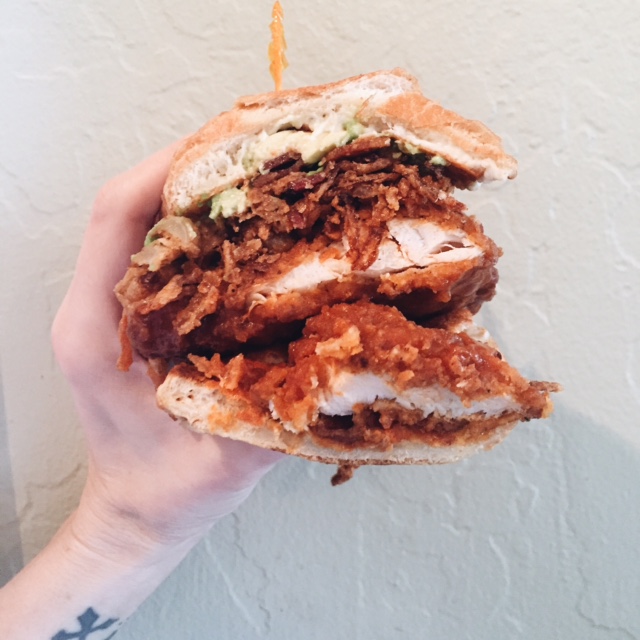 Buffalo Chicken Sandwich with avocado and shoestring onions at the Getaway Cafe. 