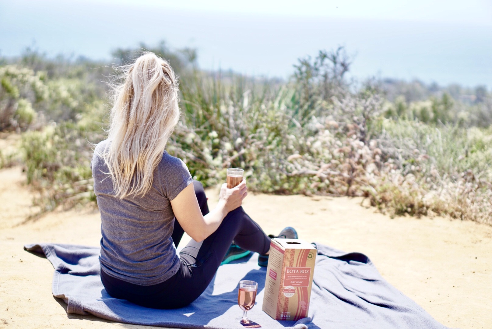 I made it! Just setting up our little wine picnic and enjoying the view of the Pacific. Of course, Bota Box Dry Rosè was the perfect choice for this adventure.