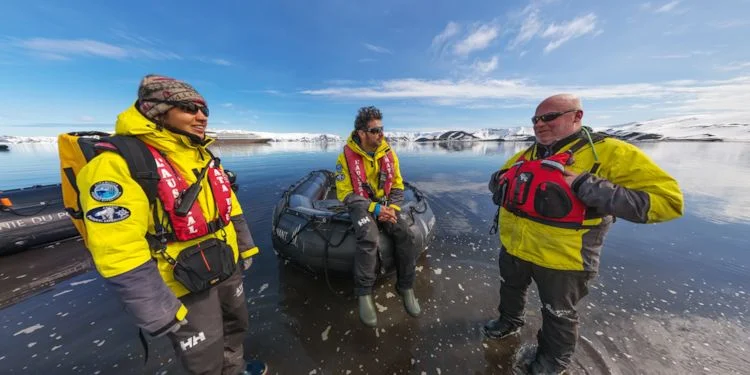Expedition team waiting for the passengers to return from the climb
